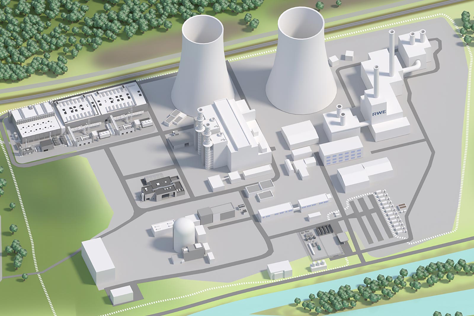 An overview of an industrial facility featuring cooling towers, buildings, and a waterway in the foreground.